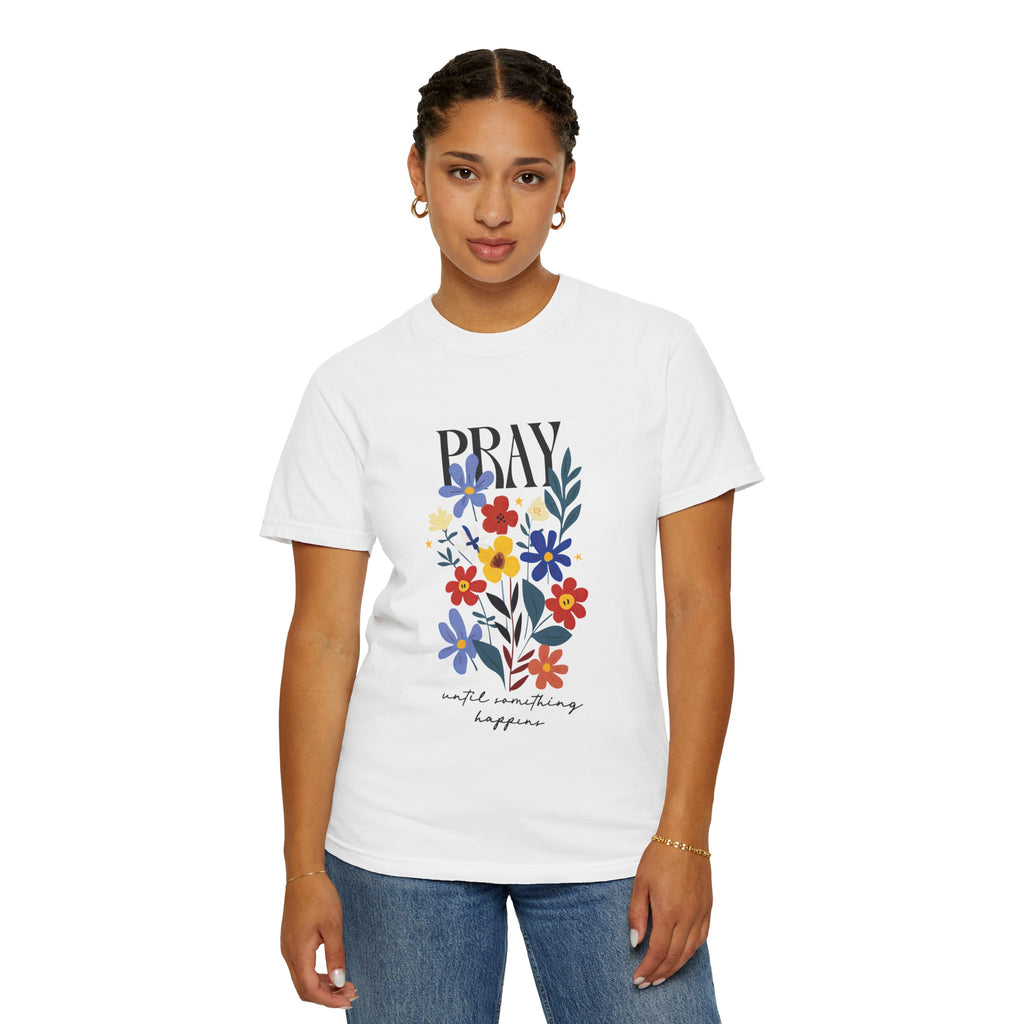 Person wearing a white t-shirt with floral design and text on a white background