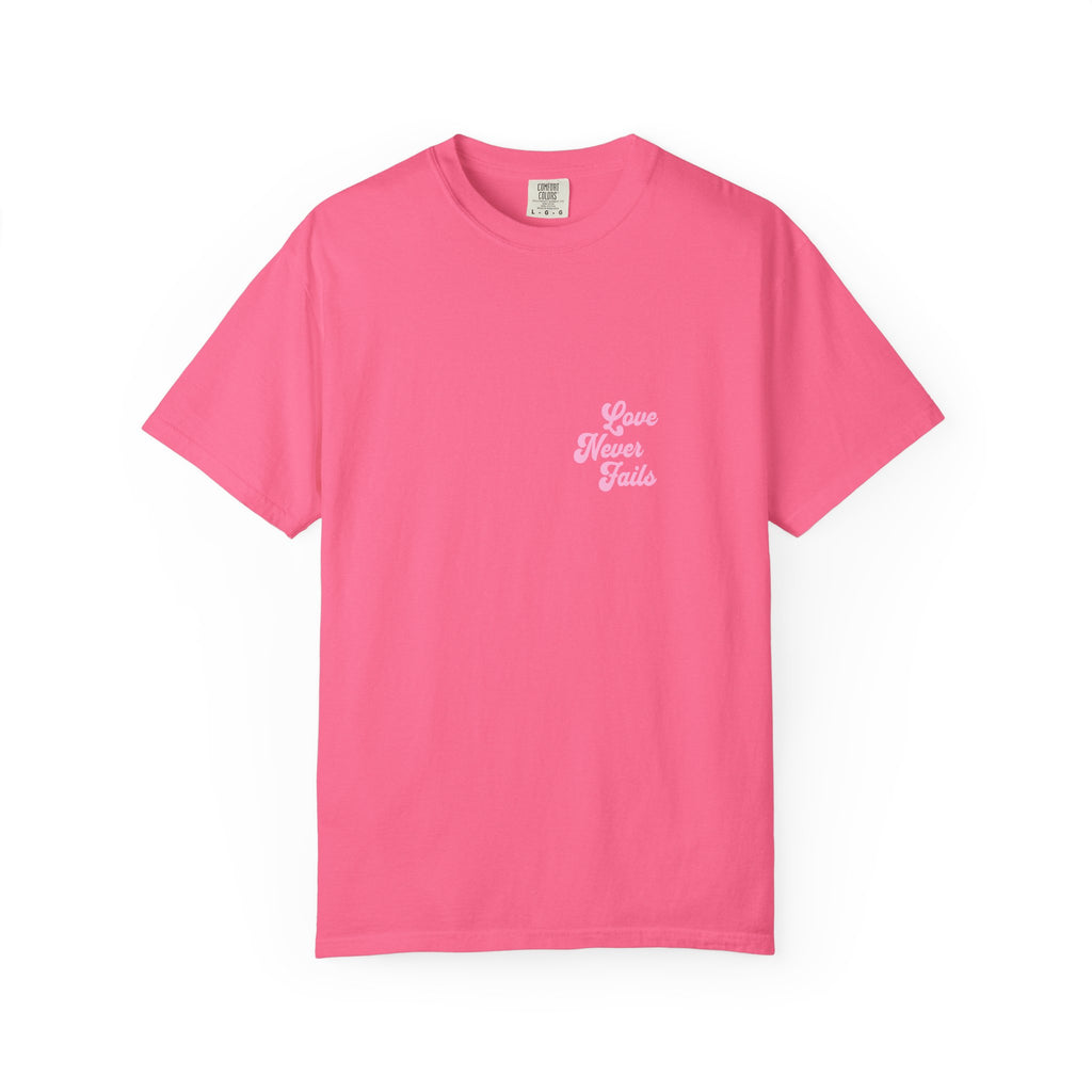 Pink t-shirt with text on a white background