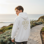 Model wearing Consider the Lilies Christian hoodie outdoor lifestyle photo