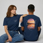 Model wearing the Enough Light For Today shirt showing the spiritual landscape design and navy premium fabric.