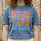 Woman wearing Eternal State of Mind faith based t-shirt in soft blue color