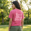 Modern faith based pink Love Never Fails t-shirt lifestyle mockup