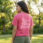 Modern faith based pink Love Never Fails t-shirt lifestyle mockup