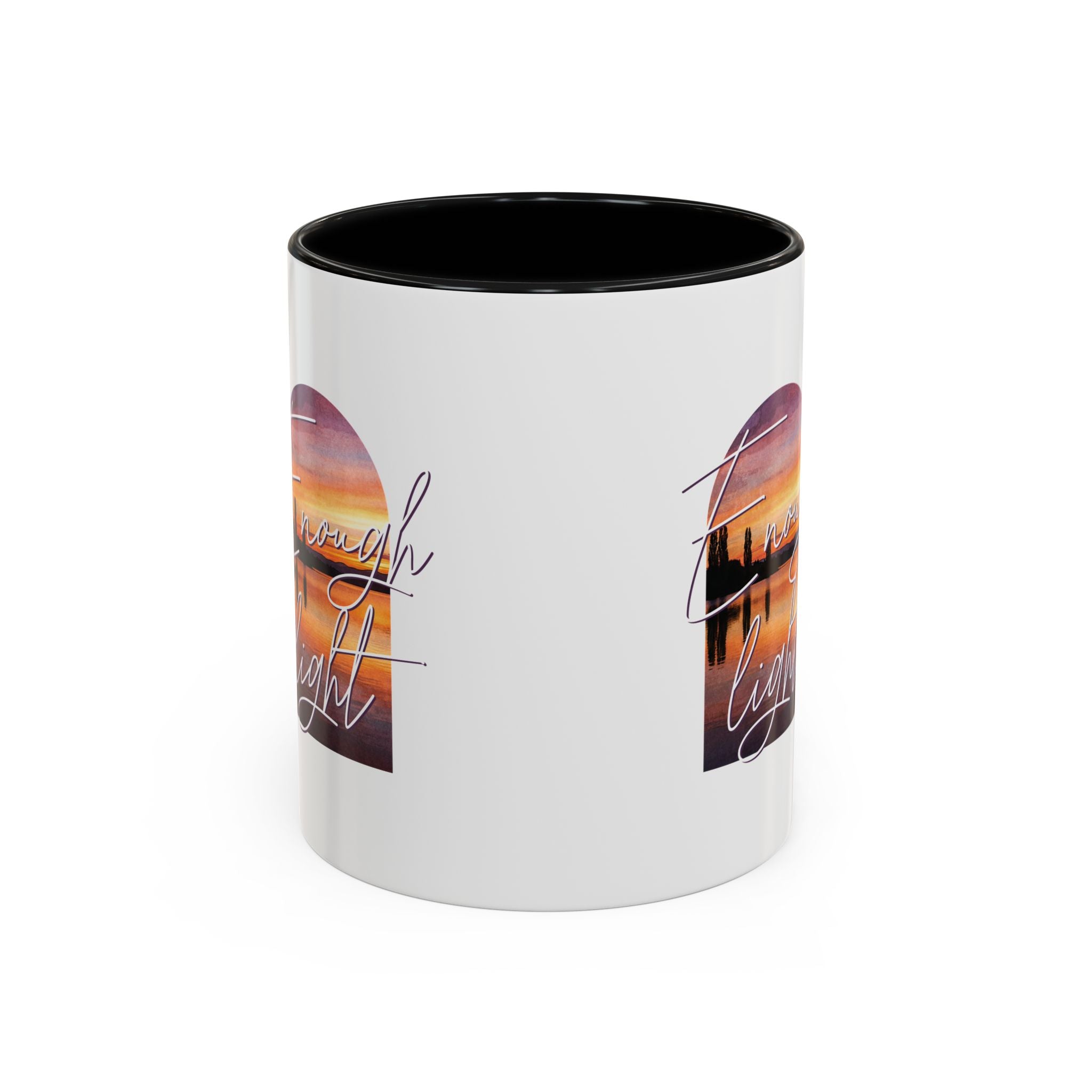 White mug with black interior and exterior, featuring a colorful design and text on a white background.